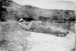 F. J. Riddell taking a nap at Bodega Bay, 1908