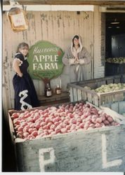 Donna Hallberg (Hallberg-Marovich and Marcia Hallberg in vintage costumes at the Hallberg Apple Farm roadside stand 1982