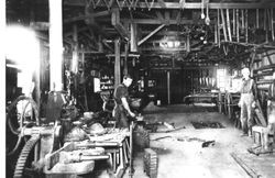 E. I Borba in his blacksmith and wagon making shop on Santa Rosa (Sebastopol) Avenue, about 1905