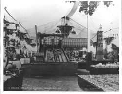 Gravenstein Apple Show displays of a lighthouse, a zeppelin (dirigible) and possibly a packinghouse conveyer belt by Stony Point