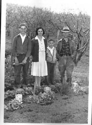 Bill Silva, Mrs. Candida Silva, Jess Silva and Mr. Harry Silva in the Silva Ranch vegetable garden, 1944