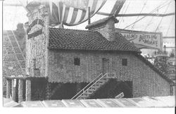 1910 Gravenstein Apple Show display of the Pleasant Hill fruit evaporator (dryer) made of whole and dried apples as seen from a different angle