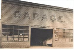 Snow and Watson Garage owned and operated by Clark Tabor Snow at Santa Rosa (Sebastopol) Avenue and Petaluma Avenue, Sebastopol, California, early 1900s