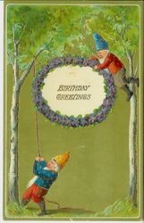 Birthday card of two gnomes hoisting a "Birthday Greetings" sign encircled with violets into the trees, dated August 14, 1910