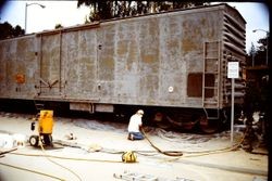 Pacific Fruit Express boxcar being refurbished and sand blasted for the West County Museum and 261 South Main Street in Sebastopol, California, 1995