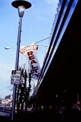 Tombe Realty sign on the east side of North Main Street in Sebastopol, California, February 1977