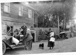 Riddell family loading a car in front of the Bodega Bay Store, Bodega Bay, California, about 1918