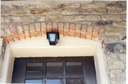 Brickwork over the doorway of the P&SR Railroad Powerhouse building at 238 Petaluma Avenue, Sebastopol, California, about 2002