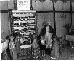 Mary Evelyn Cruse, niece of Hubert B. Scudder, at the Gravenstein Apple Show, about 1932