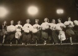 Analy High School Tigers football, about 1960--Analy Pom Pom Girls and yell leader crossing the field at half time