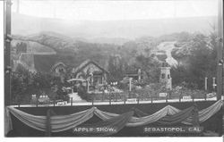 1911 Gravenstein Apple Show display showing a miniature farm made of apples