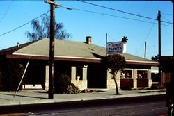 Historic Petaluma & Santa Rosa Railway depot in use as Clarmark Flower Shop at 261 South Main in Sebastopol, California