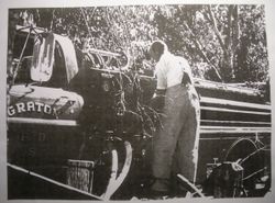 Mr. Kitchell of the Graton Volunteer Fire Department stands on Graton firetruck No. 5 at Timber Hill