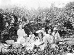 Party-goers eating apples at Blanche Riddell's 13th birthday party, 1916