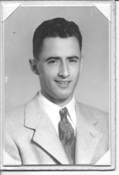 Studio portrait of an unidentified young man, about 1950