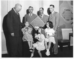 Sebastopol Apple Blossom Princesses Merideth Shelton, two unidentified young women and Sebastopol businessmen Curt Stange (Bank of Sonoma County) and Harry Martin (Martin's Nursery and Ed Herring (Best & Feaks Insurance) meet with representatives from California Governor Earl Warren at the California State Capitol in Sacramento