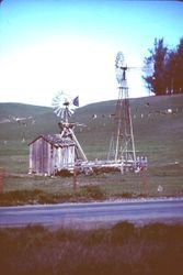 Two windmills and well house at Stony Point and Railroad Avenue in Cotati, 1977