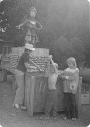 Gloria Roberts with her children Scott and Carrie Roberts in 1974 working on an Apple exhibit of Johnny Appleseed for the Gravenstein Apple Fair