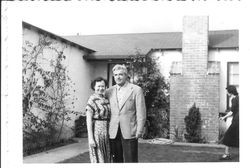 Bunni and George Streckfus in front of a house in Pacific Palisades, April, 1950
