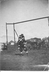 Two baseball players cut up on Graton's baseball field in downtown Graton, between Edison and Bowen Streets, a block south of downtown, 1911