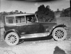 1920s car with unidentified passengers