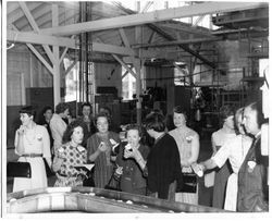 Meeting of representatives of San Francisco State College, University of California (Davis) Ag Department, Spice Islands Co., SF Schools, Sunset Magazine and Paul LeBaron of Clyde LeBaron Co. at the Hallberg cannery in Graton, California, 1960s