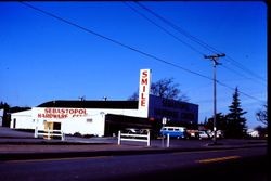 Smile sign at the Sebastopol Hardware Center at 660 Gravenstein Highway North, Sebastopol, California, February 1977