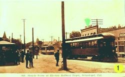 South Main Street, Sebastopol with three passenger cars of the P&SR by the original wooden depot, about 1910