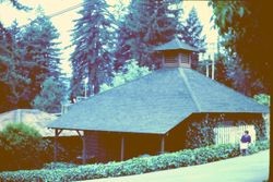 Unidentified artist sketching a building in western Sonoma County, 1982