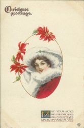 Christmas message with oval picture of a young woman in hat and furs, dated Dec. 12, 1913