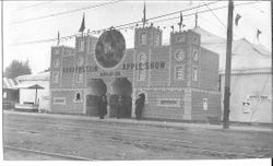 1911 Gravenstein Apple Show main entrance with facade made to look like a stone or brick castle