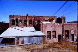 South side of businesses in the 200 block of South Main Street, Sebastopol, California, taken from the parking lot next to 238 South Main Street, 1970