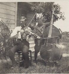 John F. Triggs on fiddle and son Glenn "Dutch" Triggs on base fiddle