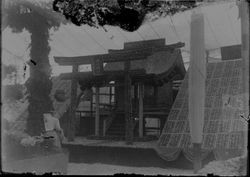Gravenstein Apple Show exhibit, about 1915 in Sebastopol, showing a Japanese pagoda made from apples with boxes of apples on either side