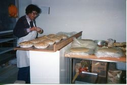 Marcia Hallberg preparing apple pies to sell at the Hallberg apple farm fruit stand located on 2500 Gravenstein Highway North (Highway 116) , Sebastopol, California