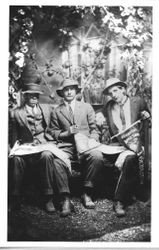 Staged photo of three young men at the 4th Annual 1913 Gravenstein Apple Show