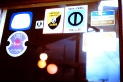 Sign for credit cards accepted on a downtown Sebastopol, California store front window