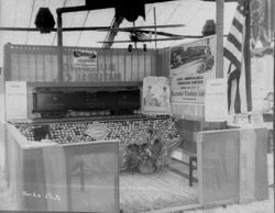Gravenstein Apple Show, about 1930, with a display of Railway Express Agency also with a sign for the National Automobile Club