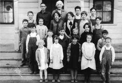 Hall School students standing on the steps of their school, 1920s