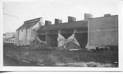 Dryer walls are being removed during the remodeling of O. A. Hallberg & Sons apple dryer/dehydrator at Graton and Bowen Roads in Graton, California, 1944