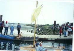 Sailboat entry in Fisherman's Float next to deck at the Fisherman's Festival in Bodega Bay, 1997