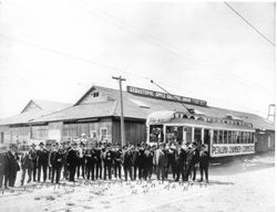 Petaluma Chamber of Commerce members at the Sebastopol Apple Growers Union packinghouse #3 with a special railroad car to Sebastopol on P&SR in connection with the Gravenstein Apple Show of 1920