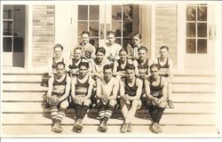 Analy Union High School yearbook (Azalea) photo in 1927 of the "B" class basketball team seated on the steps of the gym