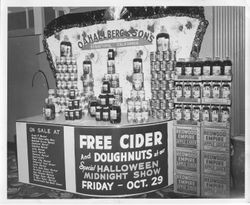 Publicity photo of O. A. Hallberg & Sons display of apple cider and apple juice