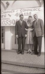 Theresa Wetch, Leo Nomellini and and unidentified man standing in front of the original Chamber of Commerce building at Santa Rosa (Sebastopol) Avenue and Petaluma Avenue