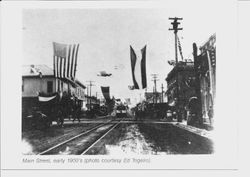 Main Street, Sebastopol, California, with the P&SR railway approaching, 1900s