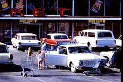 Supermarket store in Sebastopol, California, 1970 with advertisements for Blue Chip Stamps, and Del Monte