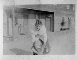 Alice Riddell Asman and her cousin Cora Miller Elvy's young daughter Harriet Elvy, in front of the Bodega Bay store, 1918