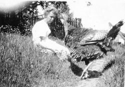 Eloise Miller Riddell with wild turkey, about 1930