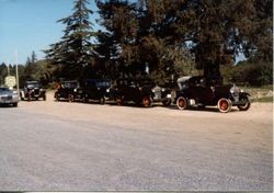 Vintage cars visit the Hallberg Apple Farm roadside stand, October, 1982